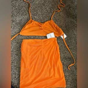 Orange set! Never worn, scrunch sequence in top and bottom !